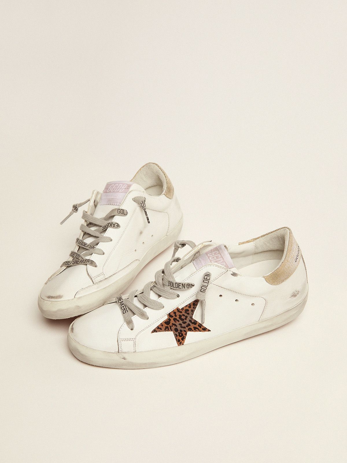 Sup-S LTD sneakers with leopard-print star and gold glitter heel tab