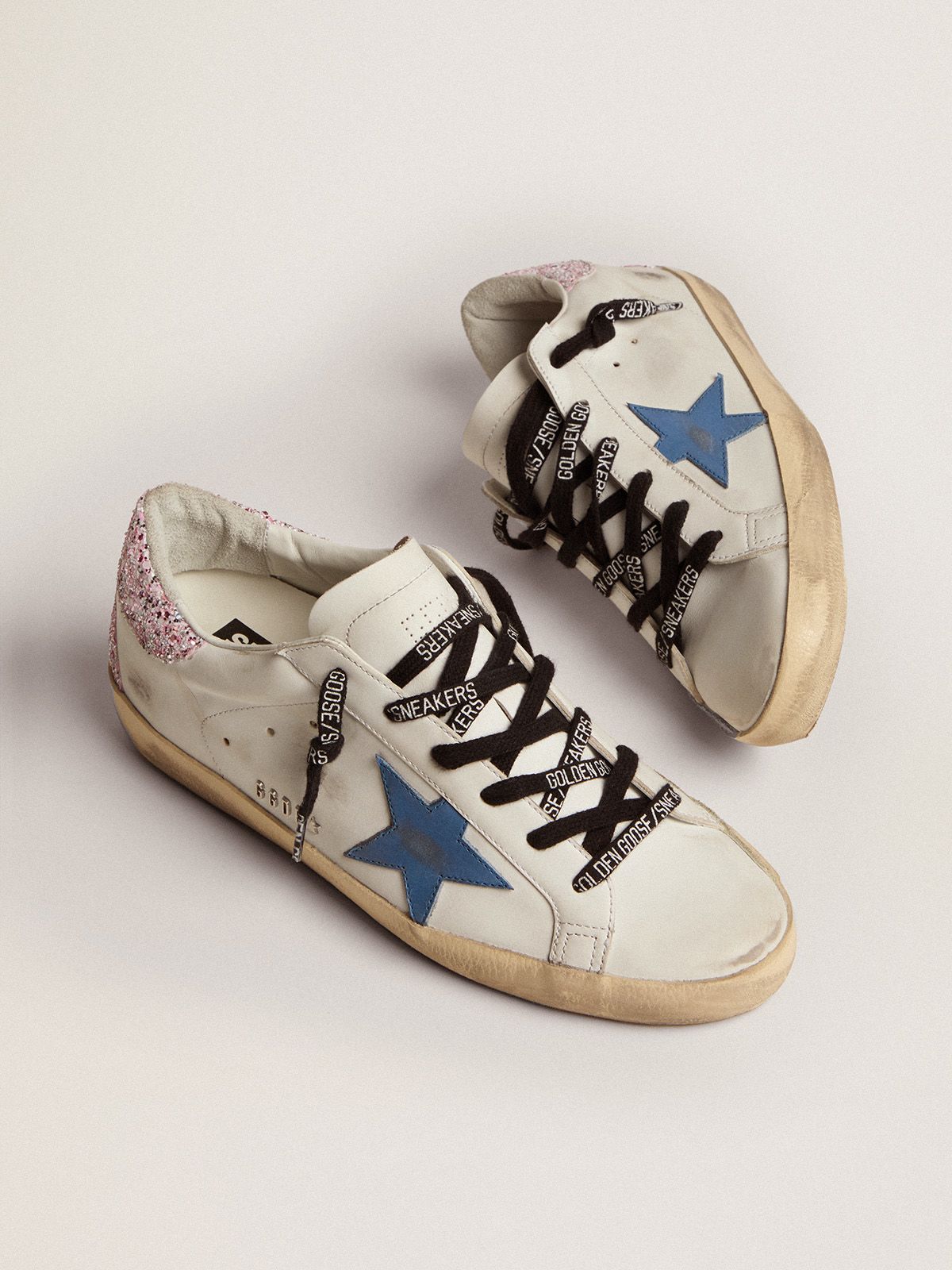 Sup-S sneakers with cobalt-blue leather star and pink glitter heel tab