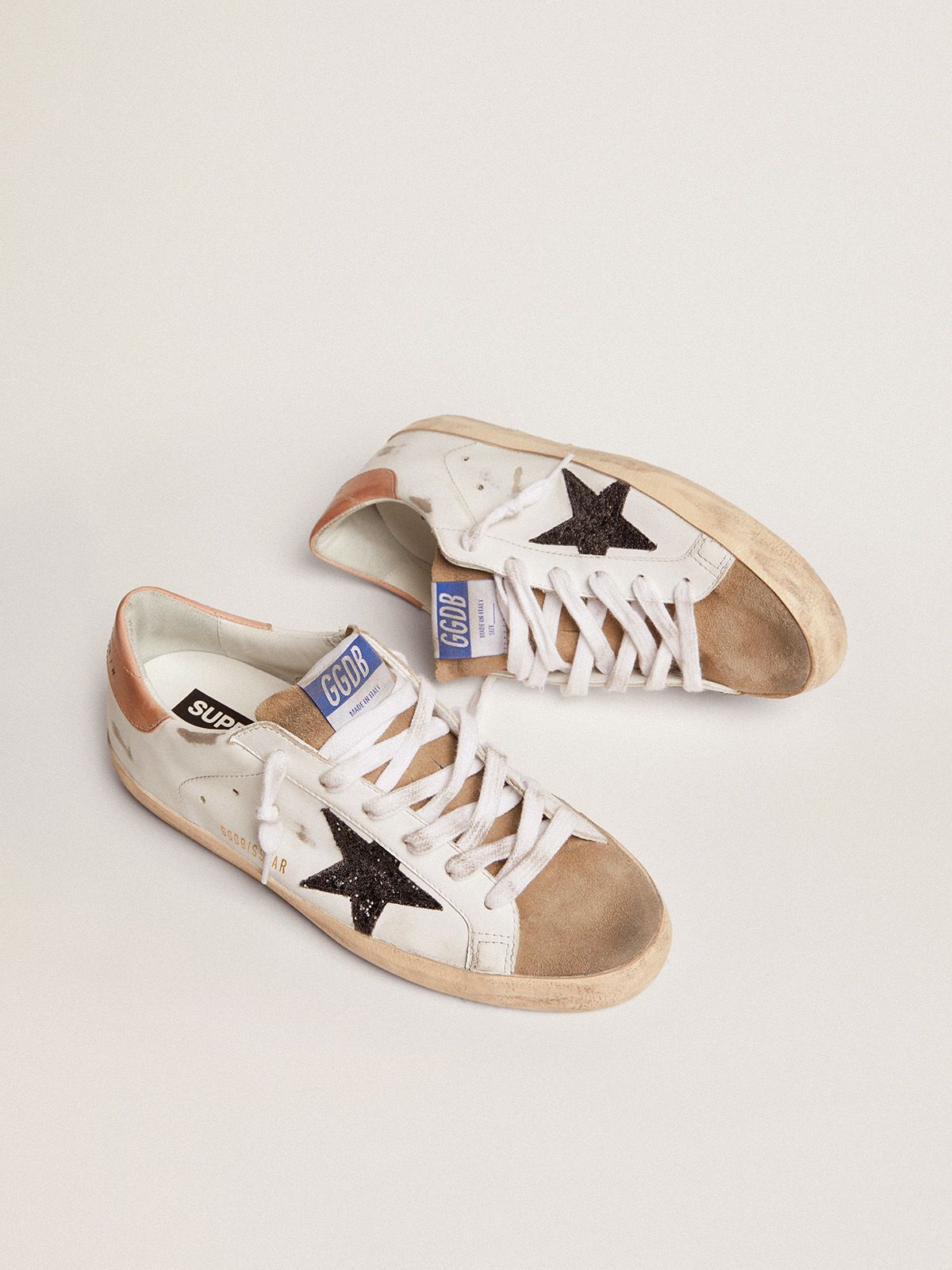 Sup-S sneakers with black glitter star and old-rose leather heel tab