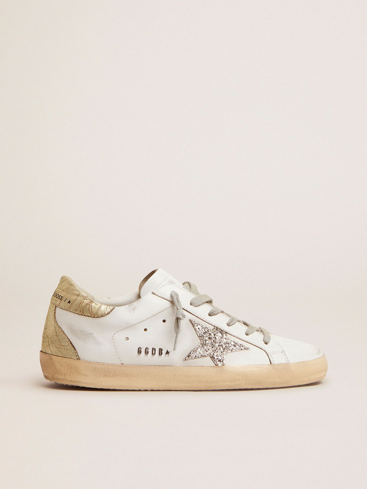 Sup-S sneakers with silver glitter star and glossy gold leather heel tab