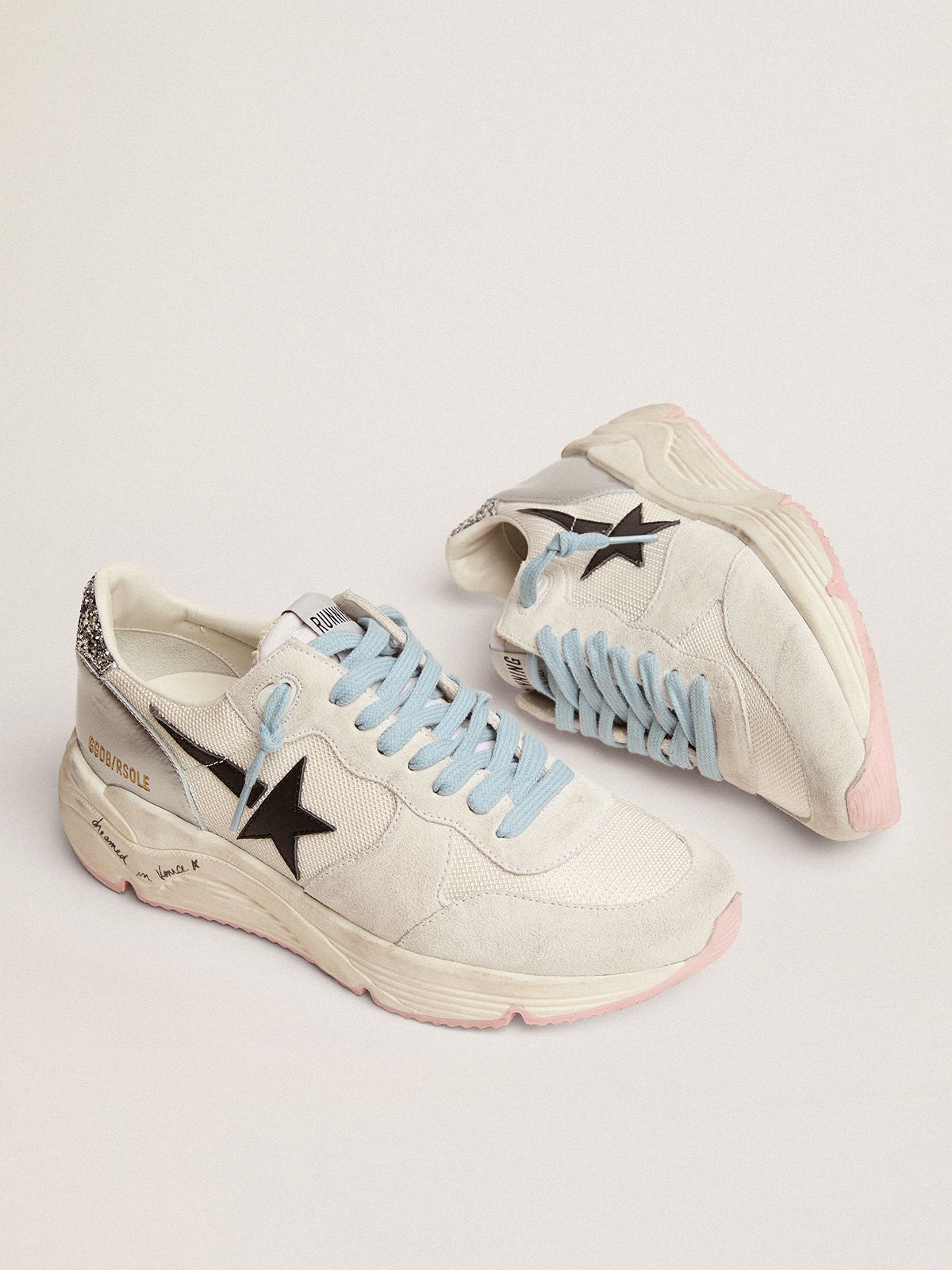Running Sole LTD sneakers in white mesh and suede with silver glitter heel tab and black leather star