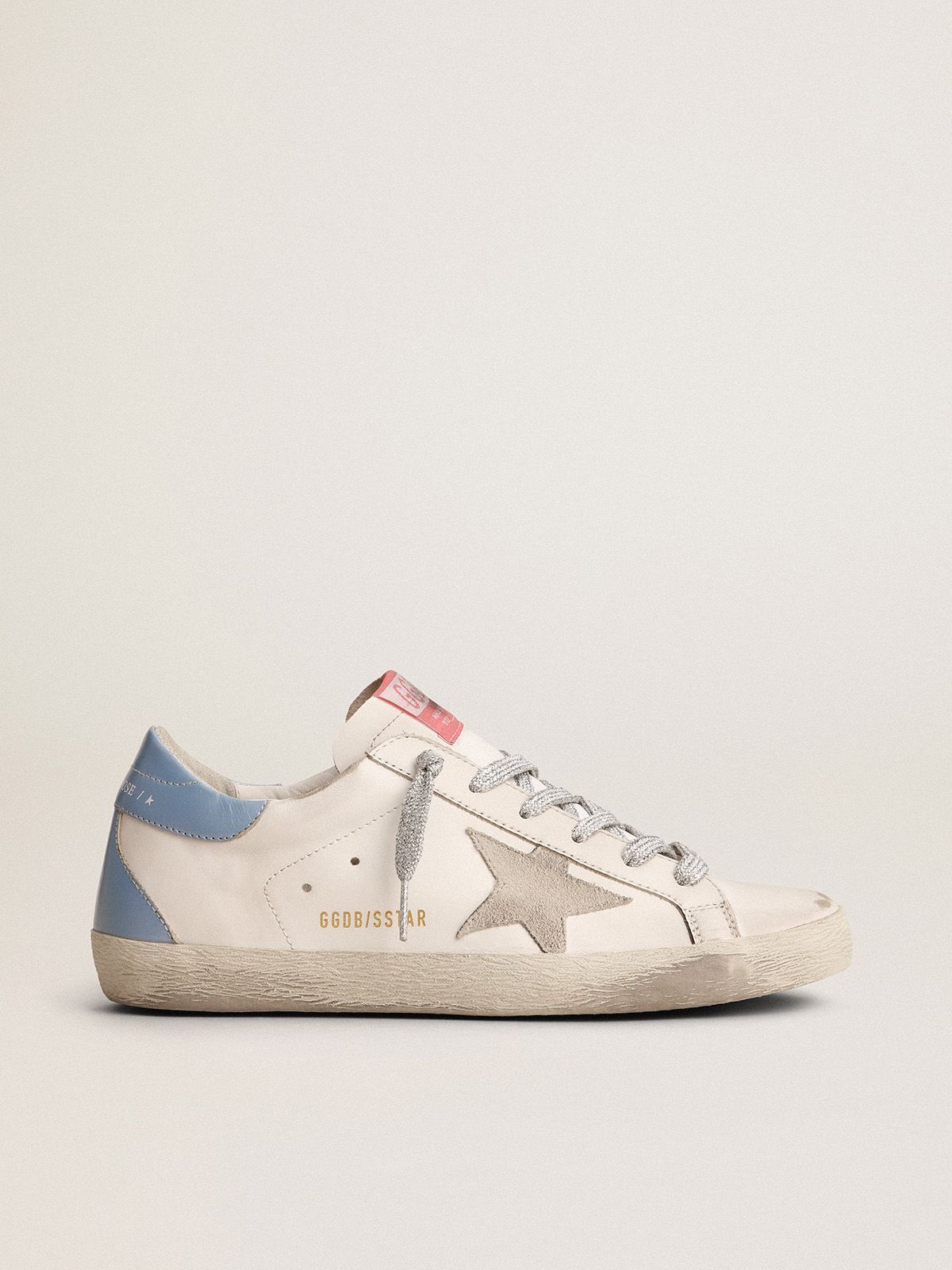Sup-S sneakers with sky-blue laminated leather heel tab and ice-gray suede star