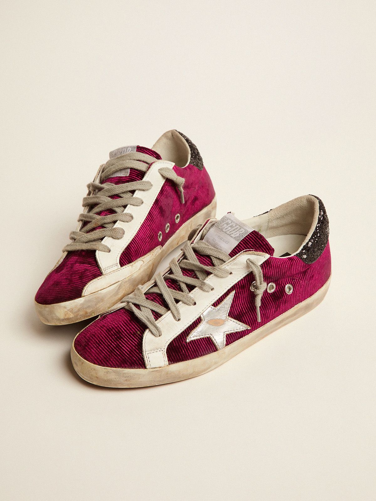 Sup-S sneakers in raspberry-red velvet and black glitter heel tab