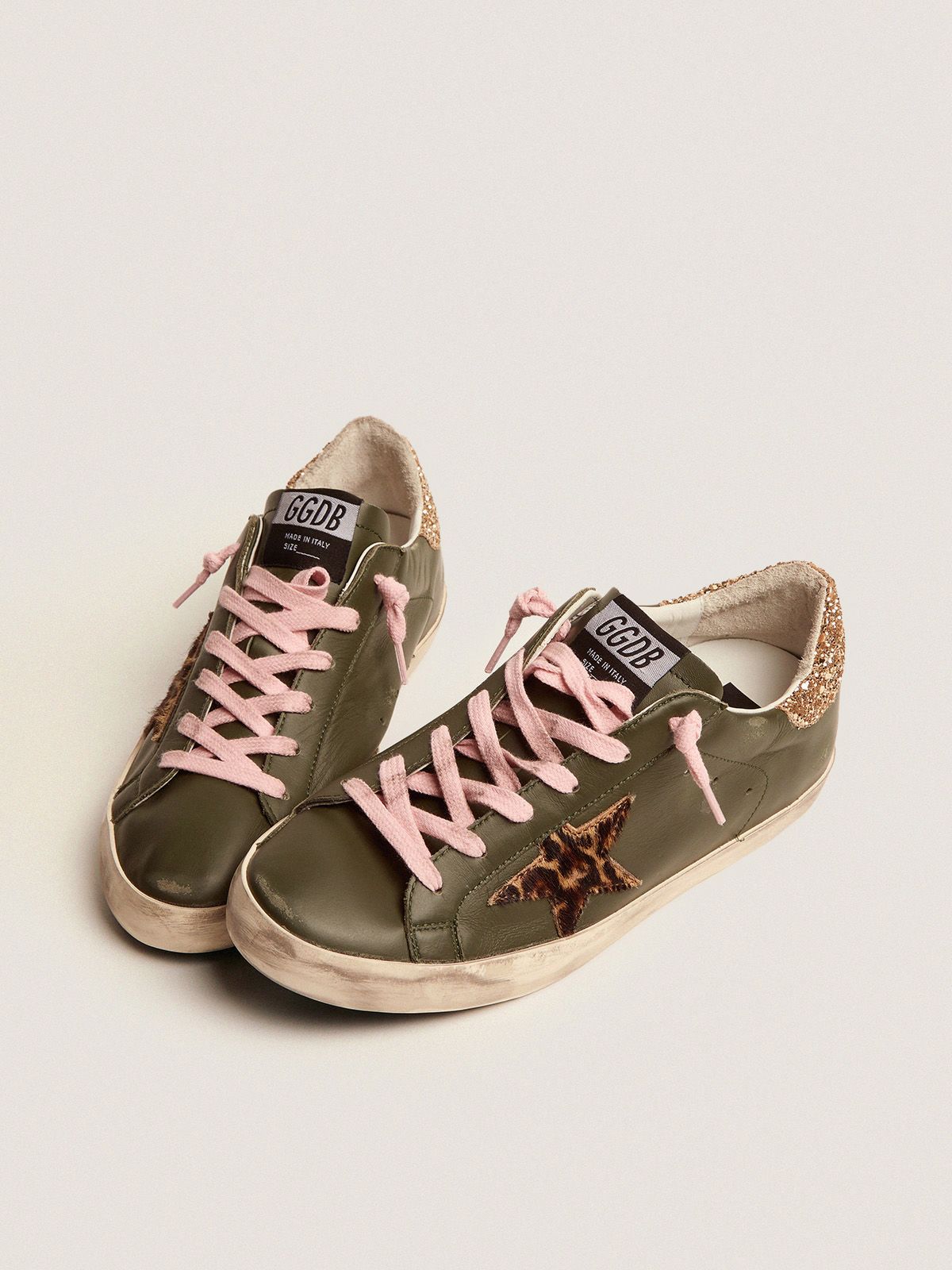 Sup-S sneakers in dark green leather with gold glitter heel tab