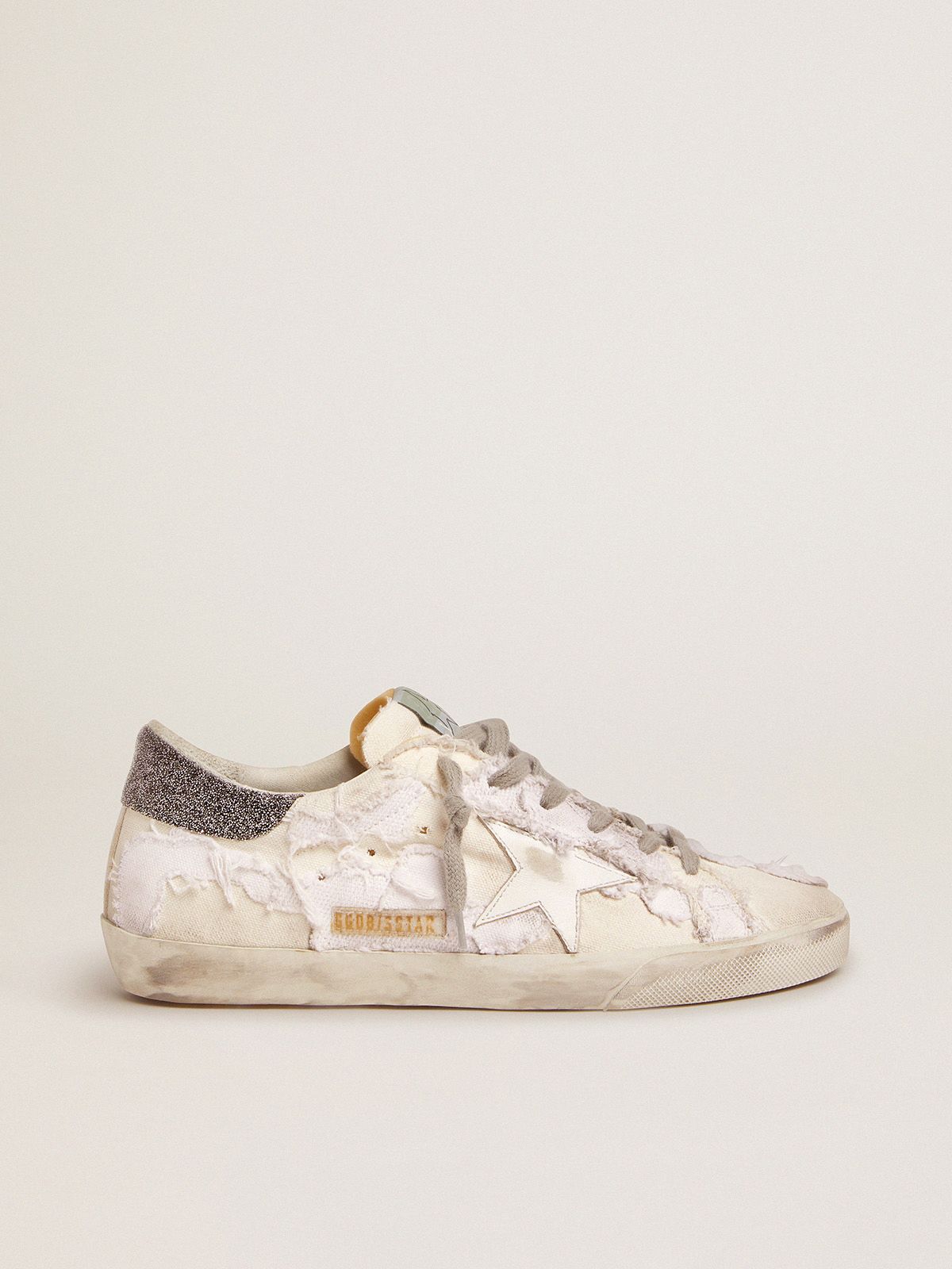 Sup-S sneakers in white canvas with black Swarovski crystal heel tab