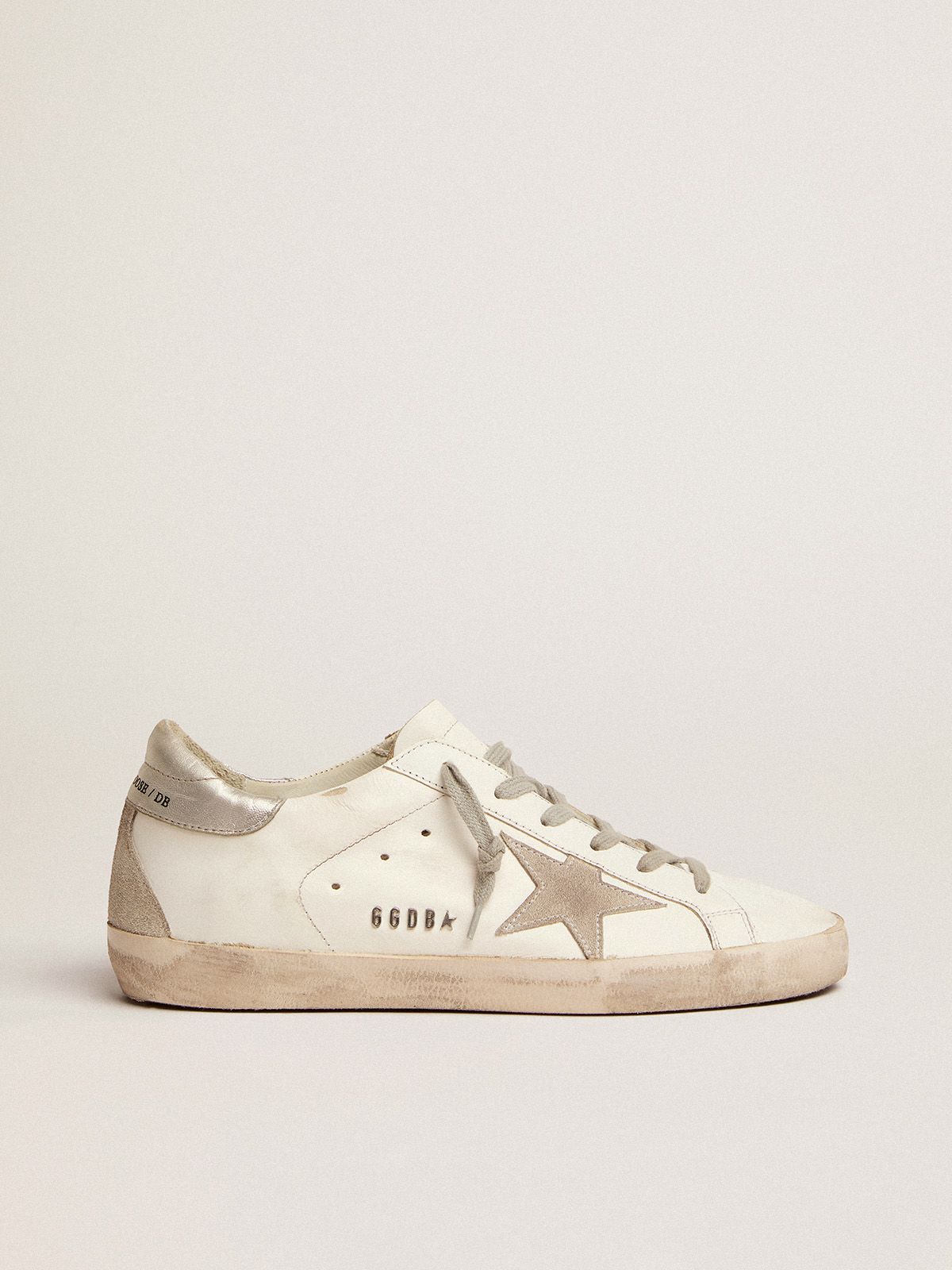 Sup-S sneakers with silver-coloured heel tab and metal stud lettering