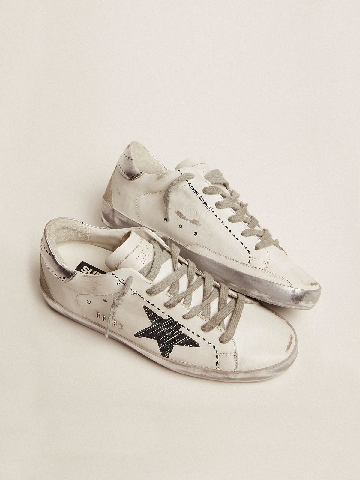 Sup-S sneakers with silver laminated leather heel tab and printed detail